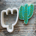 Load image into Gallery viewer, Finished Cookie cutter set  containing 1 llama cutter, 2 different cactus cookies, 1 boho rainbow, 1 feather and 1 boho mountain.
